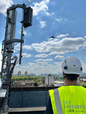 Telecoms mast being inspected by drone